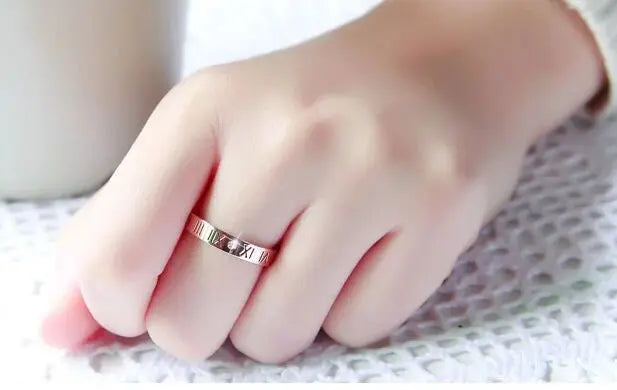Fashion jewelry elegant temperament of hollow out lucky Roman numerals rose gold plating titanium steel ring