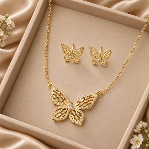 Butterfly necklace and earrings in a nude tray with satin and discreet flowers